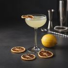 lemon drop cocktail with dehydrated lemon wheels